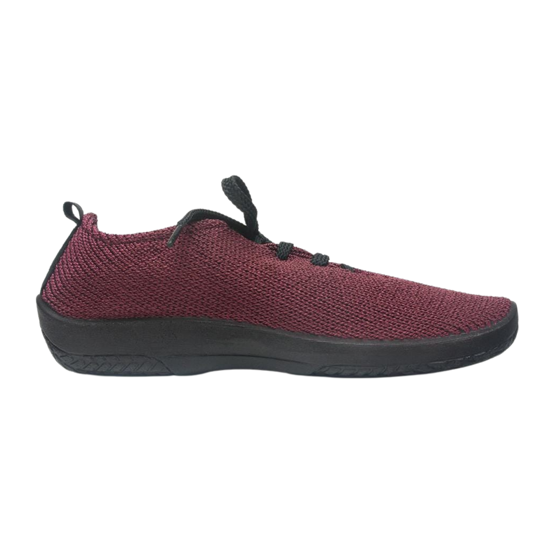 A right side view of a burgundy coloured knit shoe with black laces.