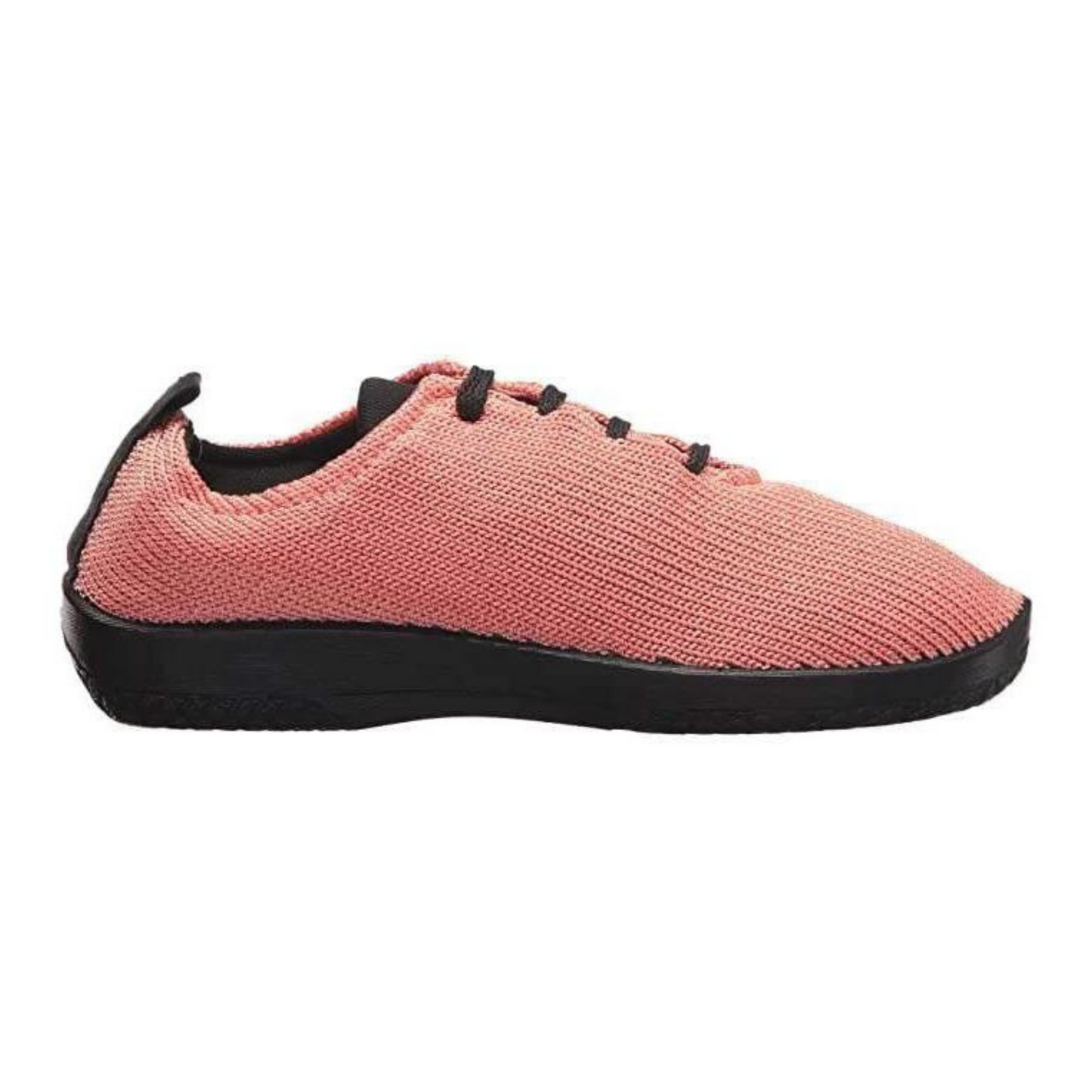 A right side view of a salmon-coloured knit shoe with black laces.