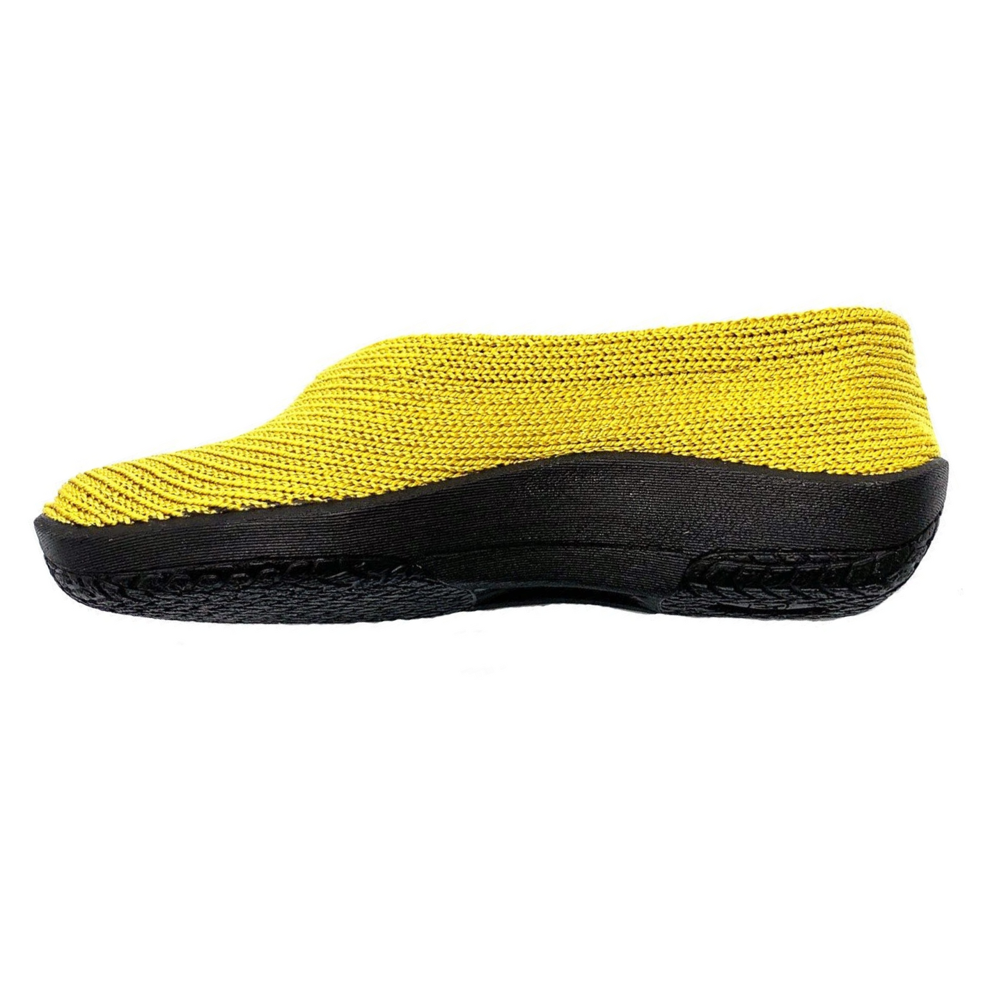 A yellow banana coloured knit shoe is pictured in profile with thick black sole.