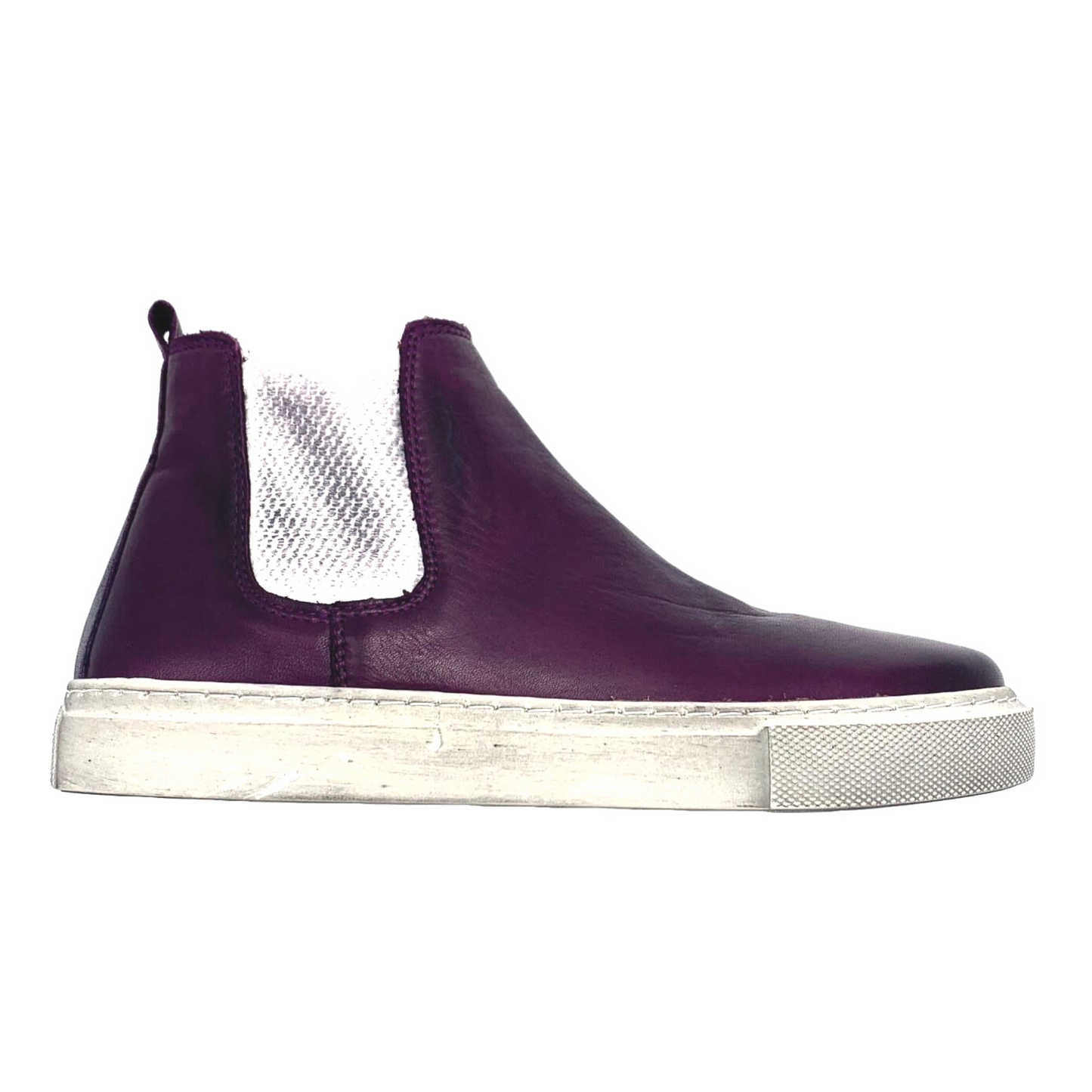 A deep purple leather boot style sneaker features white elastic ankles and an off-white sole.