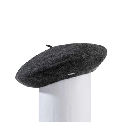A side view of a dark grey beret.