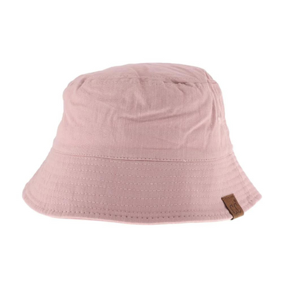 A front view of a light pink cotton bucket hat.