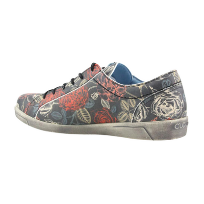 A left side view of a colourful floral-patterned sneaker.