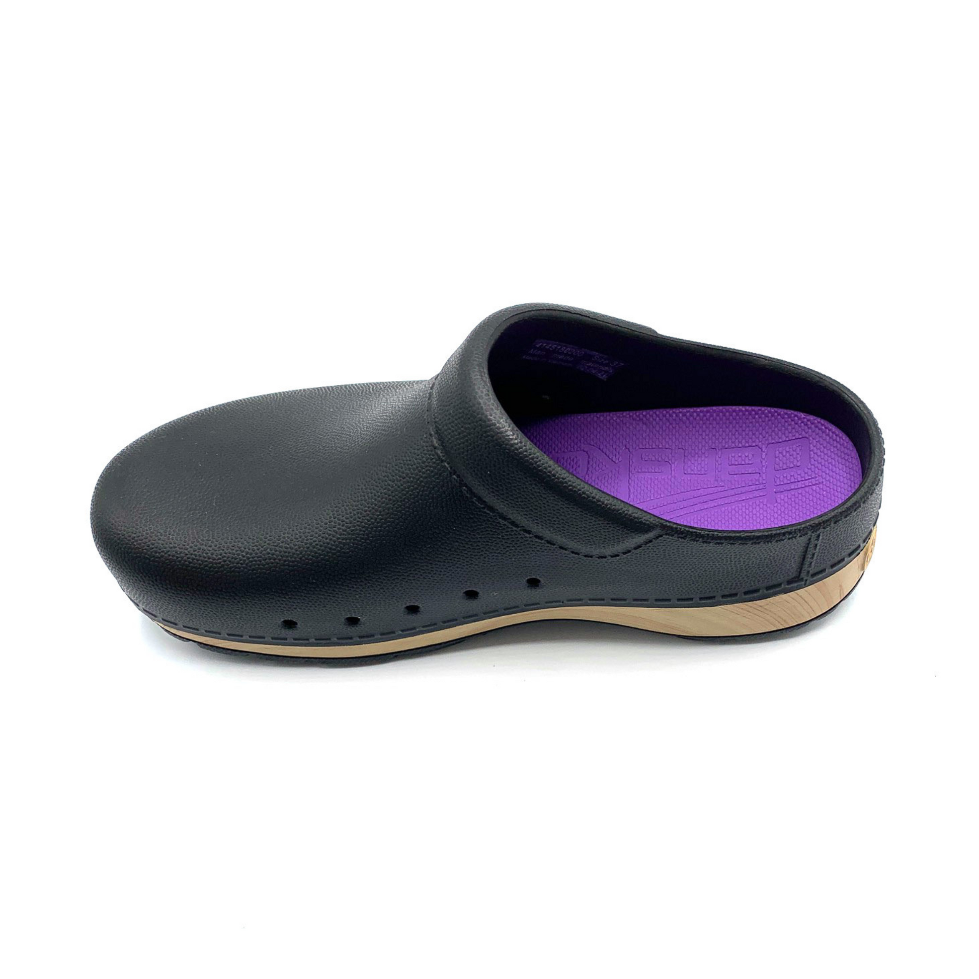 A top left view of a black clog with five small holes in the side, a wood patterned base, and a purple insole.