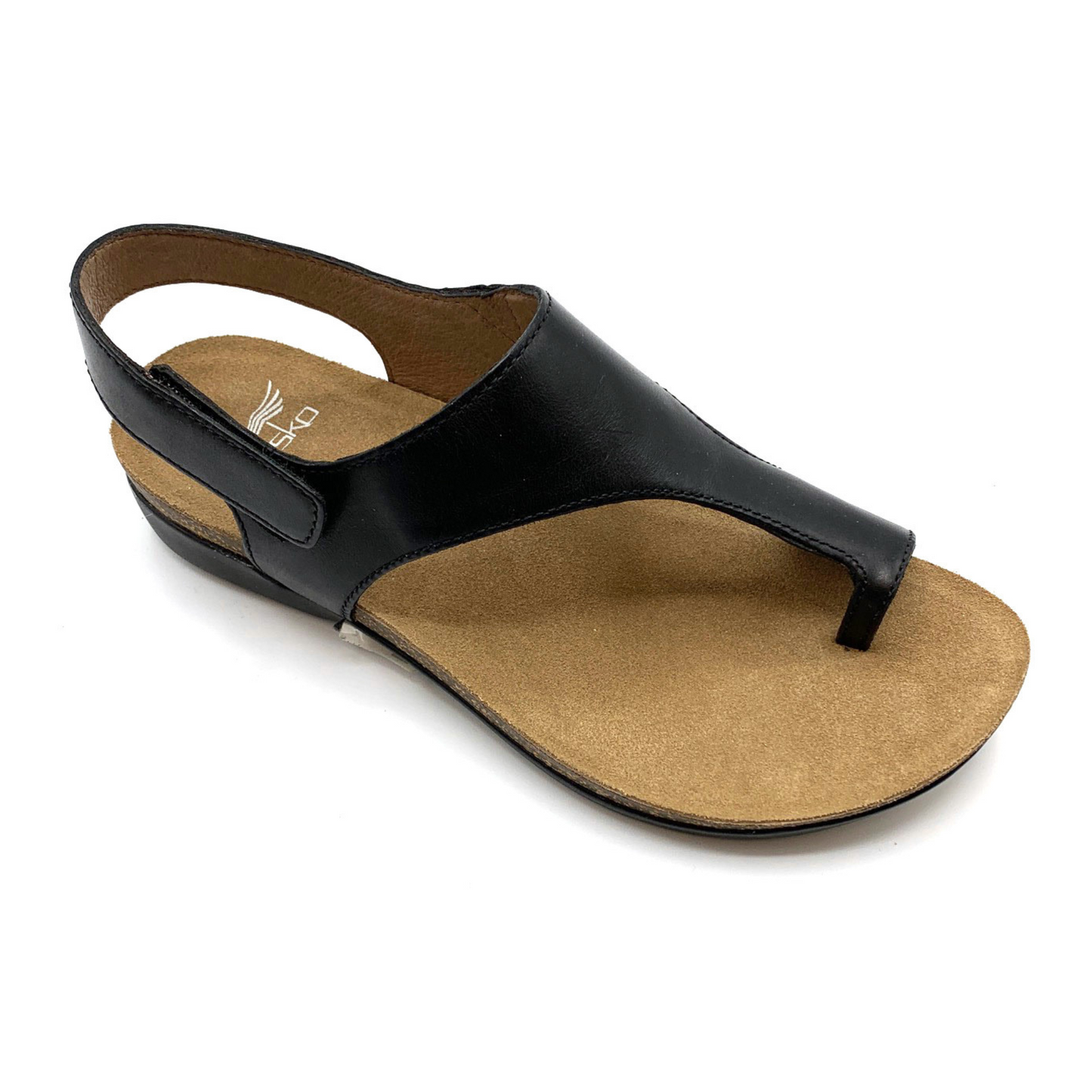 A right angle view of a leather sandal with a brown footbed, black upper strap and toe loop, and velcro adjustable back strap.