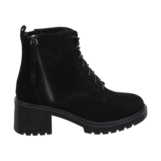 A right side view of a black suede, heeled boot with side zippers.