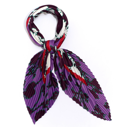 A purple, white, green, red, and maroon scarf with pleats is knotted with a loop.