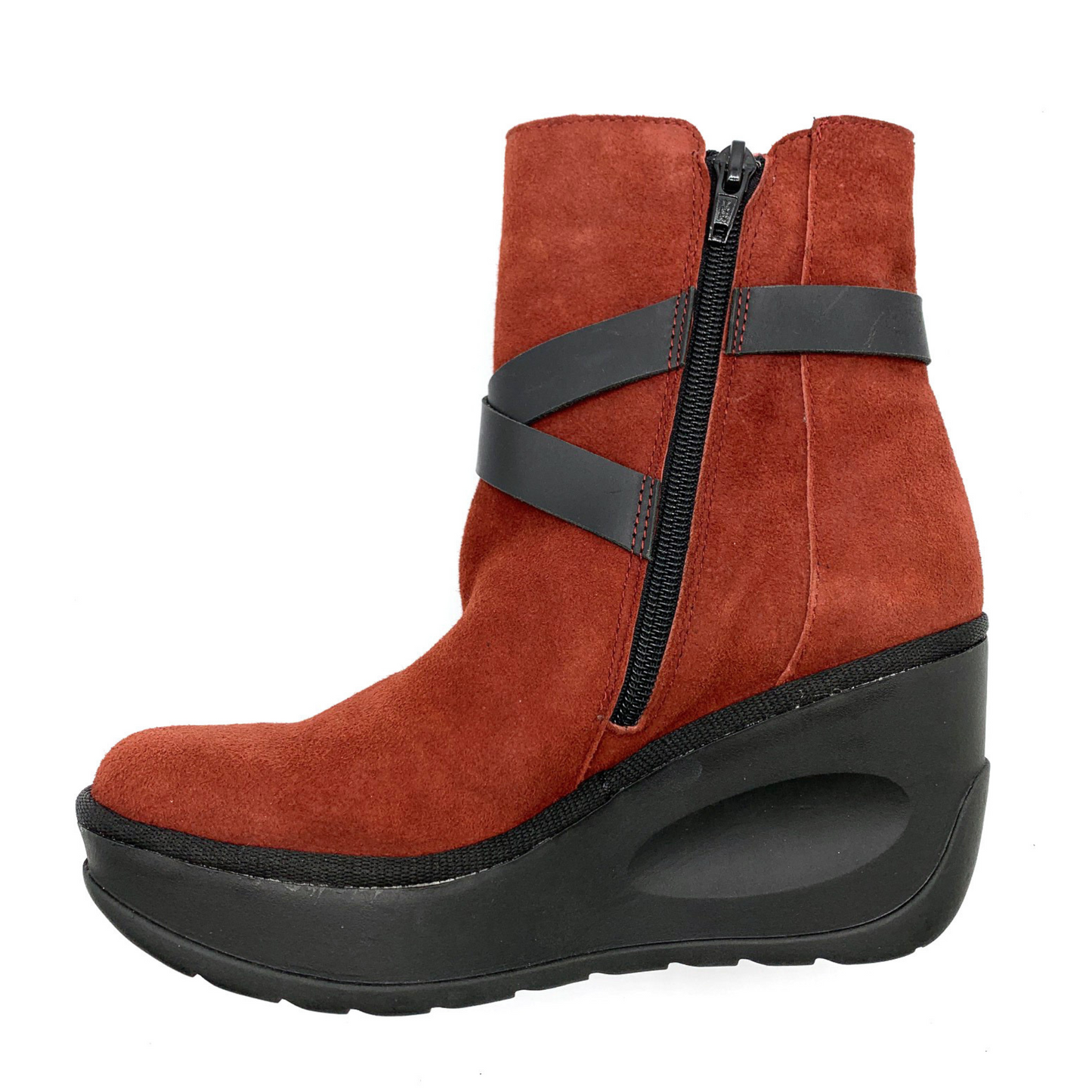 A left side view of a soft, red leather boot with a wedged black rubber sole, a black zipper up the side, and crossing black leather straps around the front.