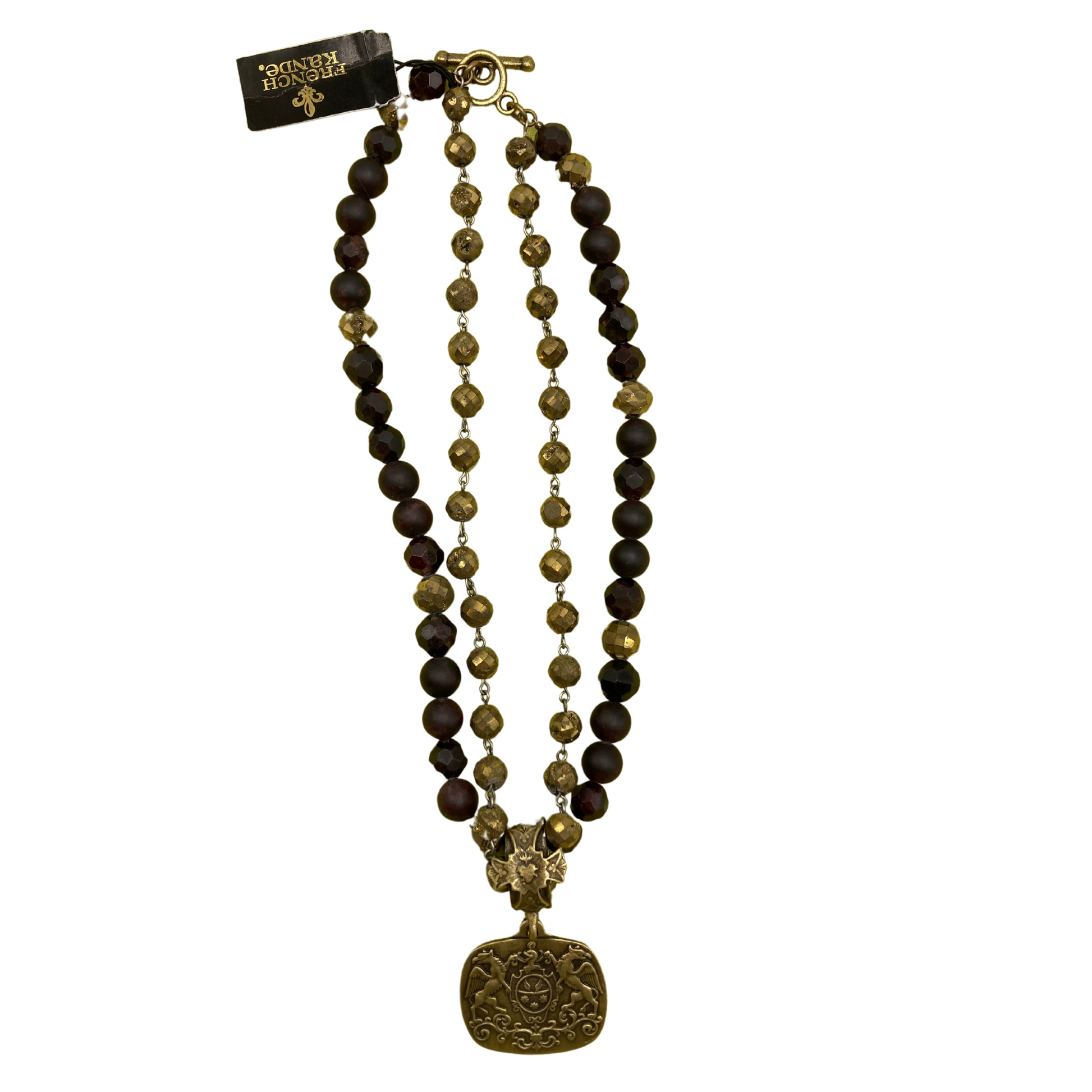A double strand, beaded necklace with a gold medallion.