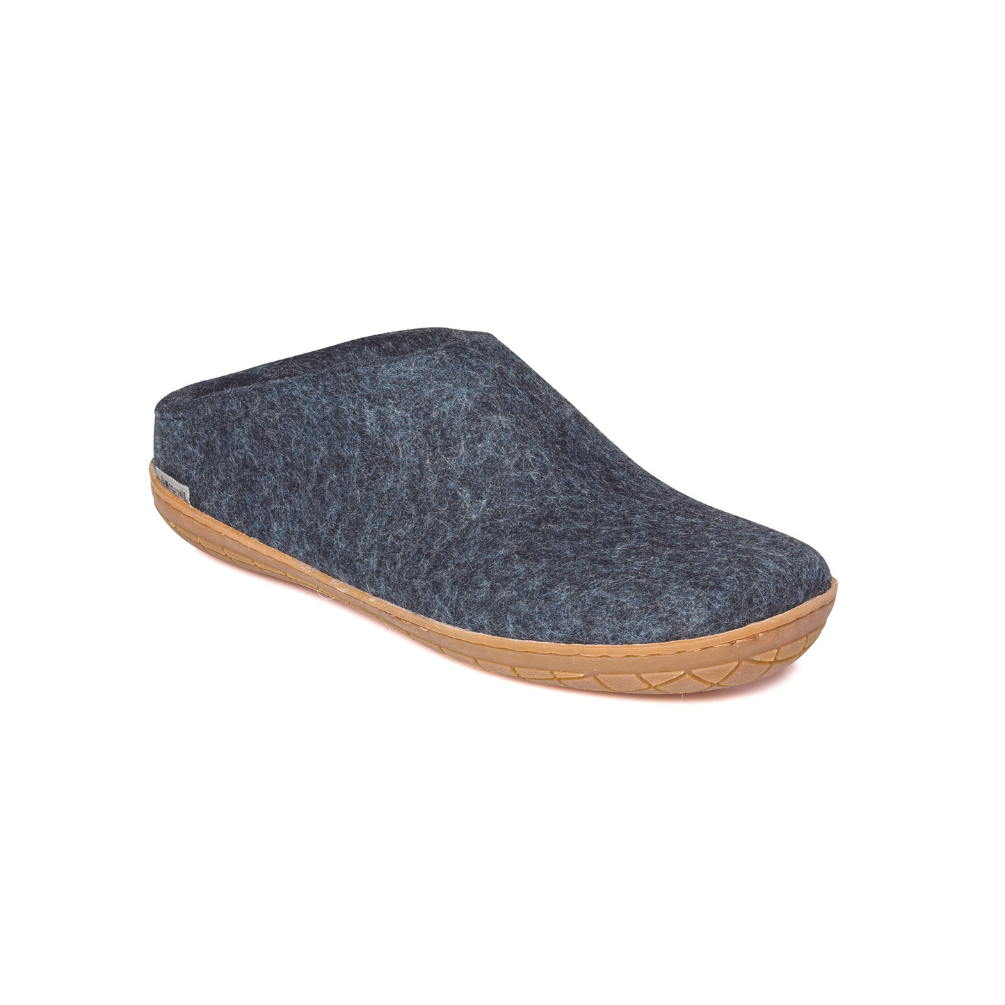 A felted denim-blue slipper pictured at a slight angle, showing part of the top front and side of the slipper. A caramel textured rubber sole lines the bottom of the shoe with a row of stitching.
