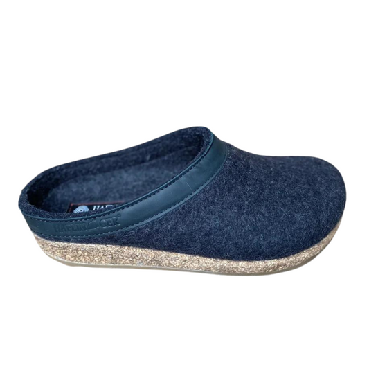A right side view of a black slipper with a cork base.
