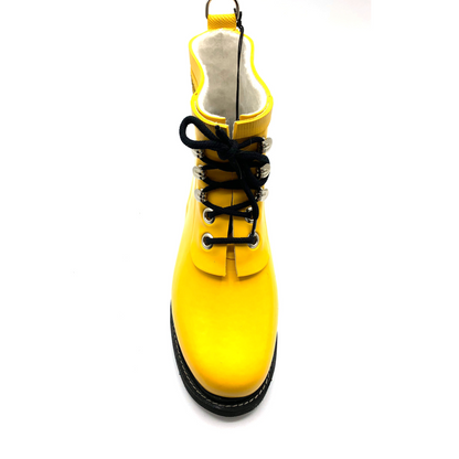 A front view of a yellow rain boot with black details.