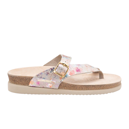 A right angle view of a cork sandal with a cream coloured outsole, white leather straps and toe loop with a colourful paint pattern, and a gold buckle.