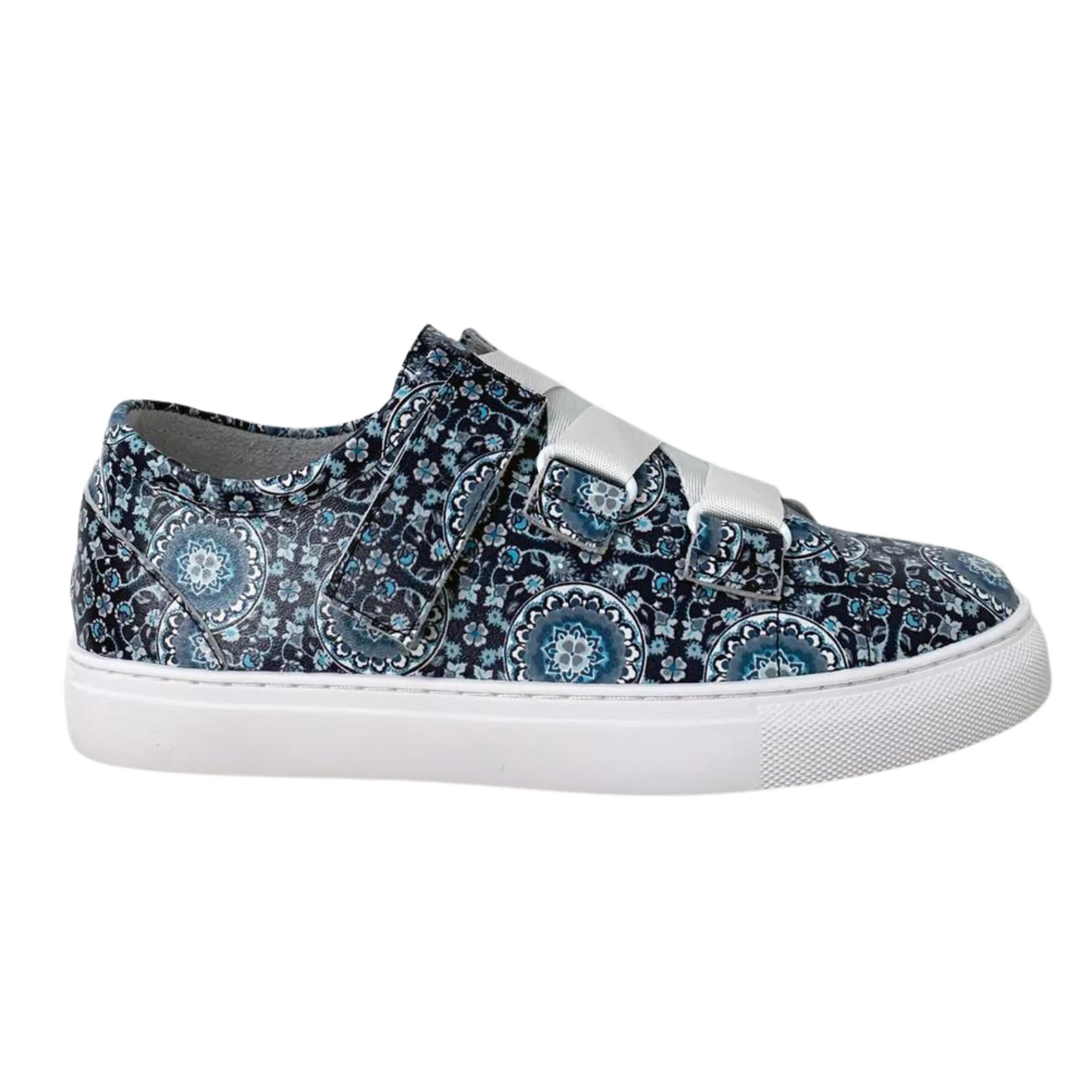 A right side view of a blue patterned sneaker.