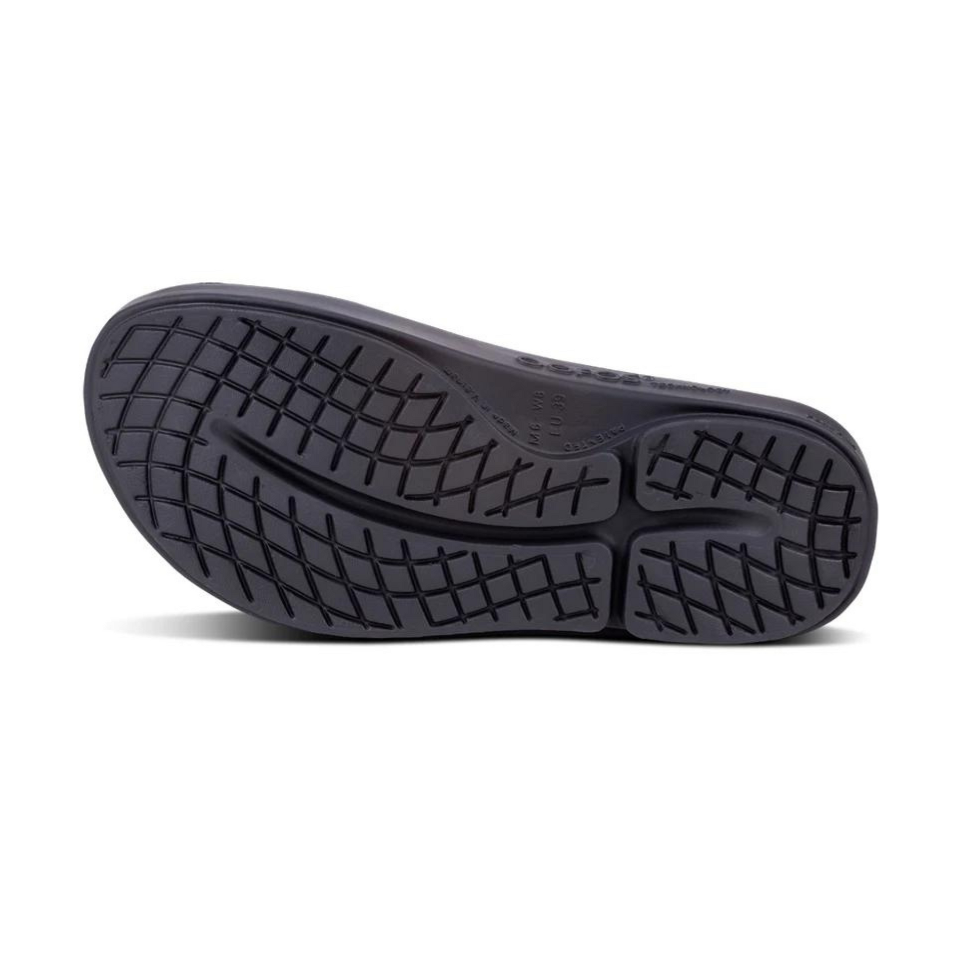 A bottom view of a black slide with a grippy pattern.