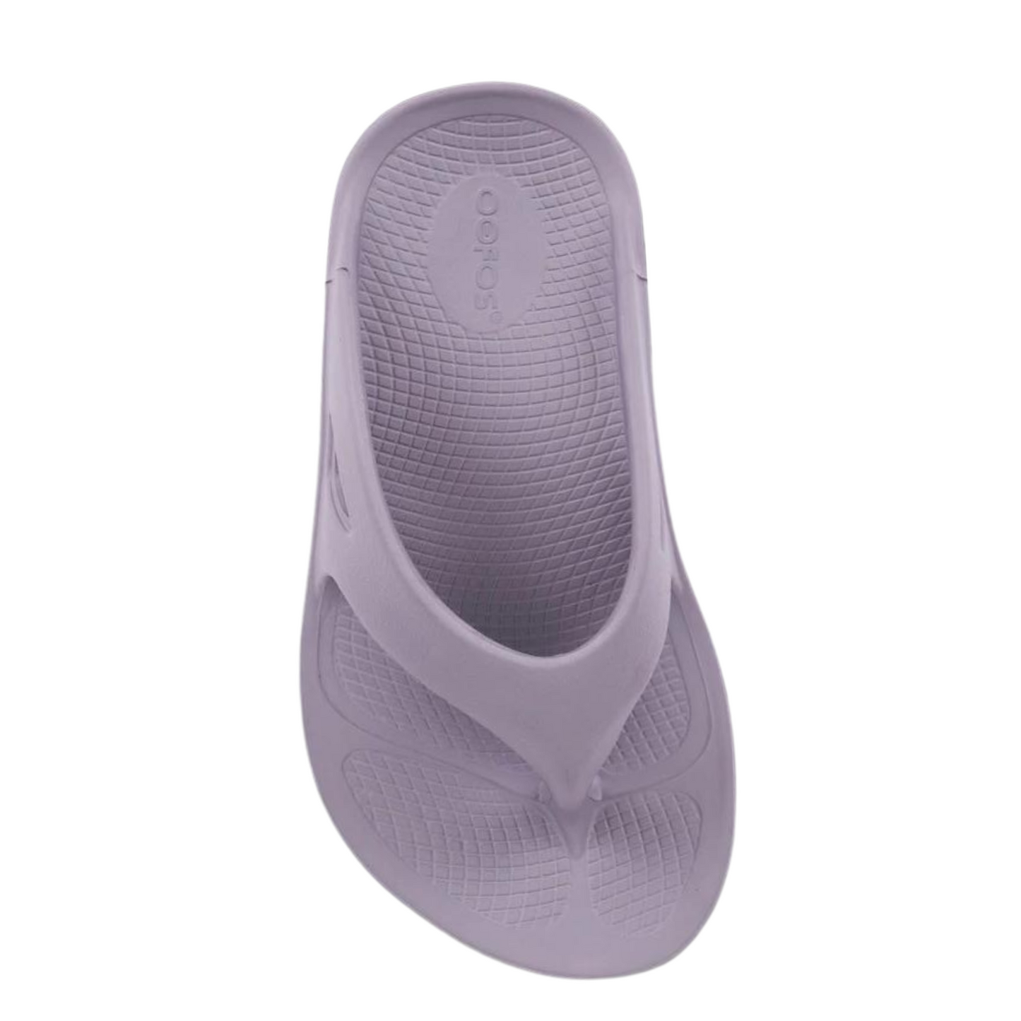 A top view of a light purple foam sandal with a between-toe strap.