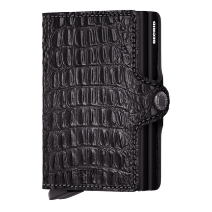 A textured black crocodile wallet pictured with two black metal aluminum cardholders.