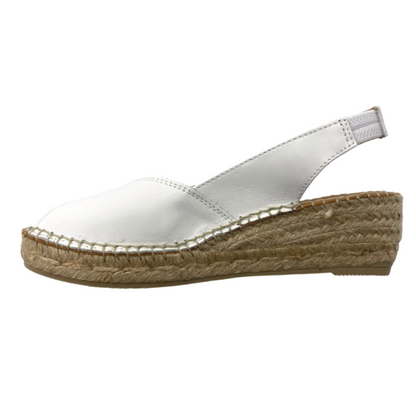 Inside view of a white espadrille sandal.  Peep toe front and open heel.  Slip on style but does have a back strap with an elastic for best fit.  Sole is a braided rope