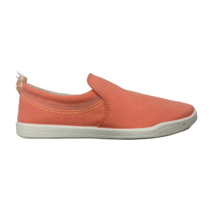 A right side view of a pink slip-on sneaker with a white outsole.
