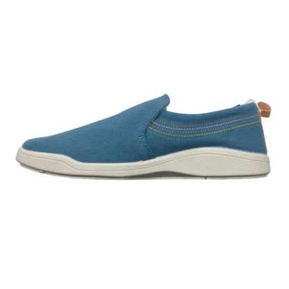 A left side view of a blue slip-on sneaker with a white outsole.
