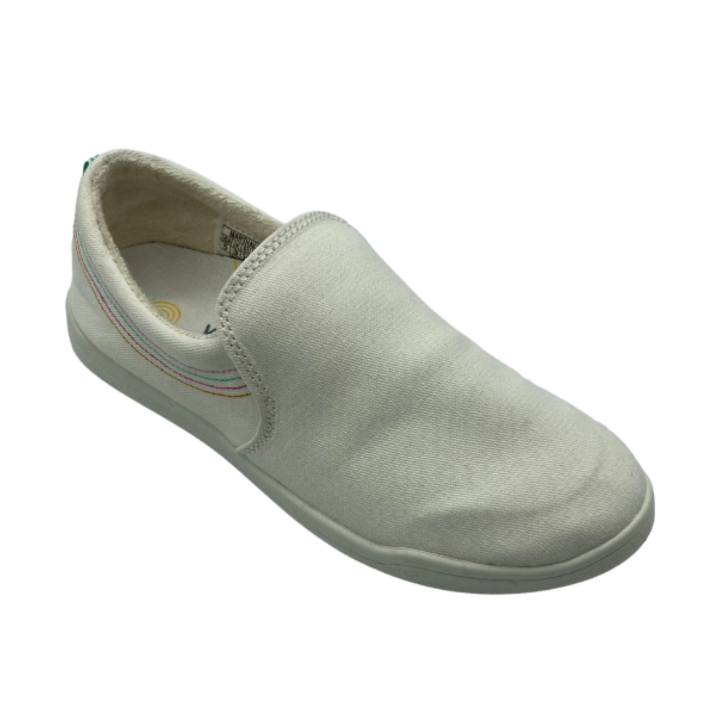 A 45 degree angle view of a white slip-on sneaker with a white outsole.