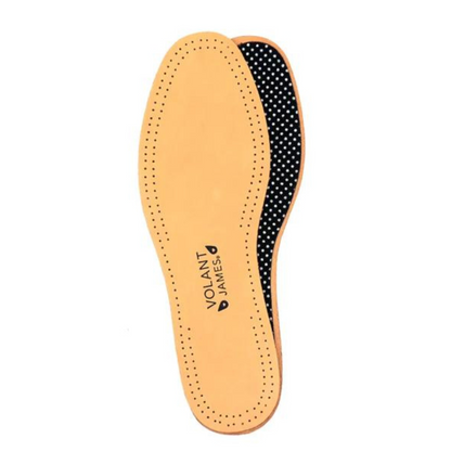 A top down view of the back and front of a tan leather insole with a black Volant James logo in the middle.