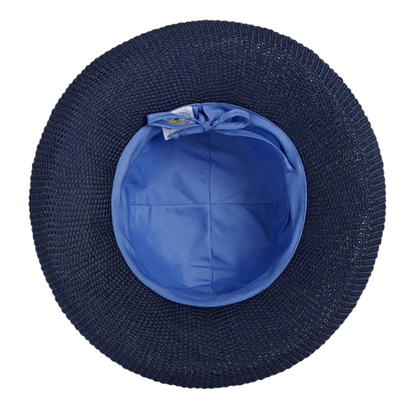 Hat pictured from below shows the dark navy brim connected to a fabric lining in light lilac blue with drawstring.