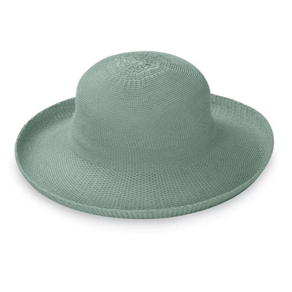 Light blue-green weaved hat with soft curvature and rolled in brim.