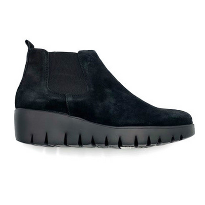 Suede black chelsea boot with thick platform sole and elastic side cut out pictured in profile.